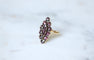 Bague 55 Bague marquise en or rose 18kt et grenats sur paillon 58 Facettes
