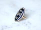 Bague 61 Bague navette en or rose 18k et argent, émail bleu et diamants 58 Facettes