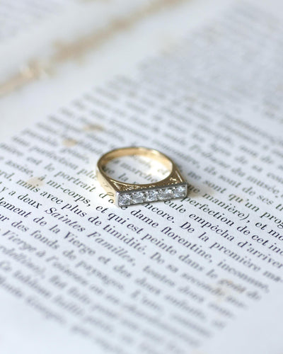 Bague 52 Bague jarretière Art Déco en or jaune et blanc et diamants 58 Facettes