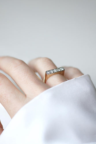 Bague 52 Bague jarretière Art Déco en or jaune et blanc et diamants 58 Facettes