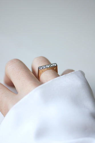 Bague 52 Bague jarretière Art Déco en or jaune et blanc et diamants 58 Facettes