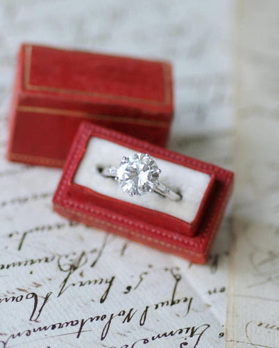 Bague 55 Bague solitaire en or blanc avec diamant 3.18 ct et diamants baguette 58 Facettes