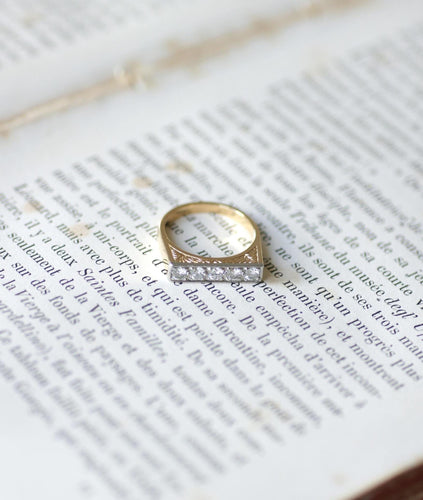 Bague 52 Bague jarretière Art Déco en or jaune et blanc et diamants 58 Facettes