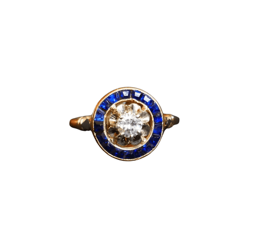 Ring 55.5 Ring adorned with a Diamond, surrounded by calibrated Sapphires 58 Facettes