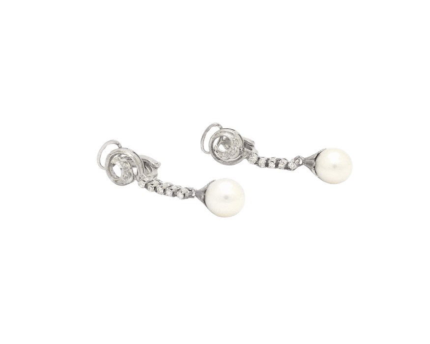 Boucles d'oreilles en or blanc avec perles et diamants