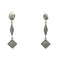 Boucles d'oreilles Boucles d’oreilles pendantes géométriques en or blanc 14K et diamants 58 Facettes UN0151