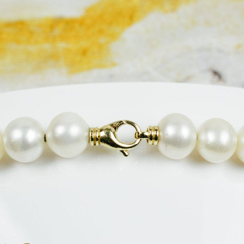 Collier Collier de perles de culture d’eau douce en or jaune 14K 58 Facettes 2272