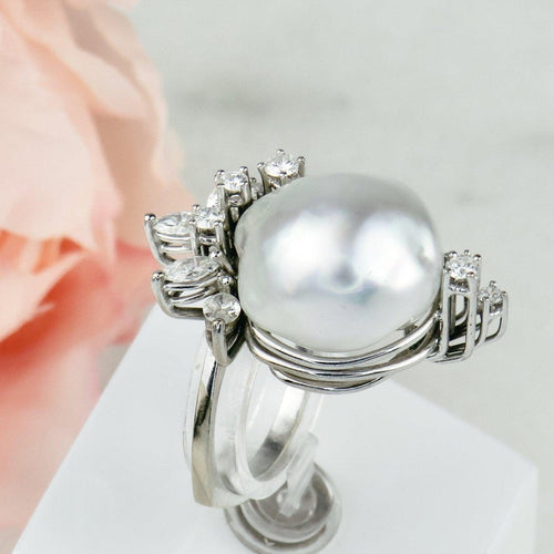 Bague 55.5 Bague en or blanc 750 avec perle baroque et diamants 1,2 ct 58 Facettes 1855