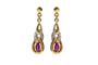 Boucles d'oreilles Boucles d'oreilles vintage en or avec rubis et diamants. 58 Facettes 11257