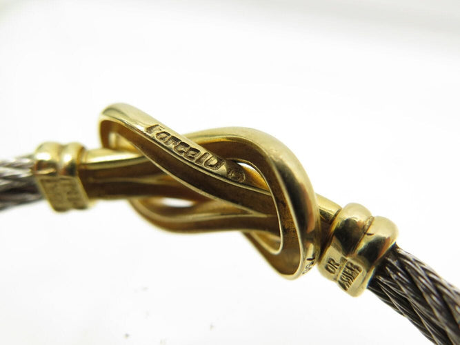 Bracelet vintage bracelet FRED force 10 infinie gm or jaune 18k acier t16.5 58 Facettes 271707