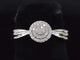 Bague 54 Bague entourage en or blanc avec diamants 58 Facettes 2001