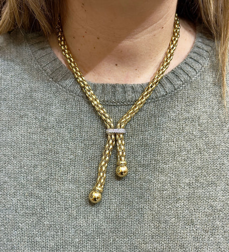 Collier Collier maille Popcorn à pompons en or 18 carats 58 Facettes