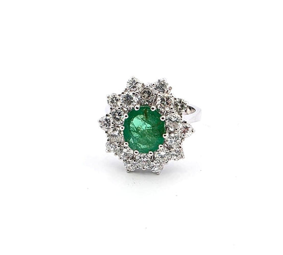 Bague 52 Bague en or blanc avec émeraude centrale et diamants 58 Facettes