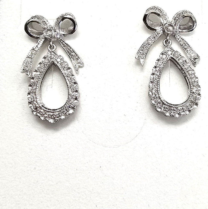 Boucles d'oreilles en platine avec diamants