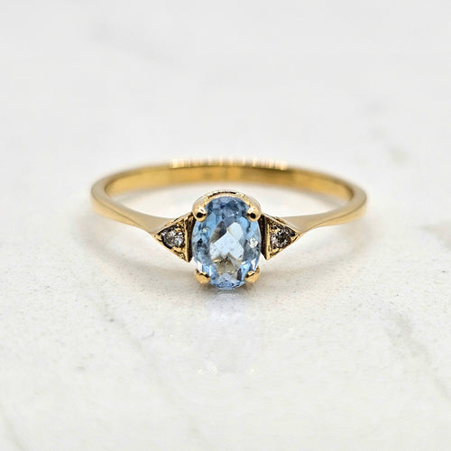 Bague 52 Bague or jaune, aigue-marine, diamants 58 Facettes 698