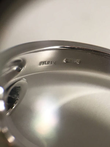 Bague 50 Bague BVLGARI modèle Astrea en or blanc 18K et diamants 58 Facettes