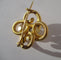 Broche Broche ancienne quadrilobée en or jaune 18 carats et diamant 58 Facettes