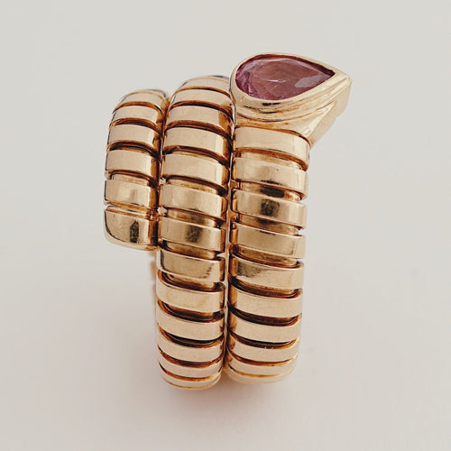 Bague 51 BULGARI - Bague Tubogas « Serpenti » en or jaune et tourmaline rose, vers 1980 58 Facettes