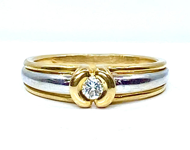 Bague solitaire 2 ors 18 carats et diamants