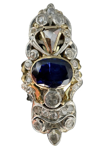 Bague 56 Bague d'époque XIXème siècle sertie d'un saphir, roses de diamants et diamant taillé en triangle 58 Facettes