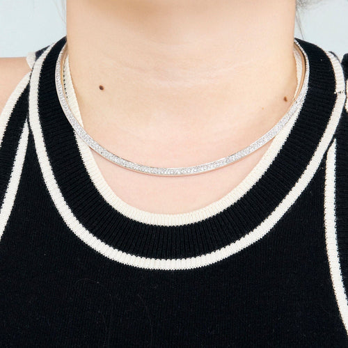 Collier Collier torque or gris et diamants 58 Facettes 250176