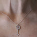 Collier TIFFANY & CO - Collier KEY en or blanc et diamants 58 Facettes D363581SO