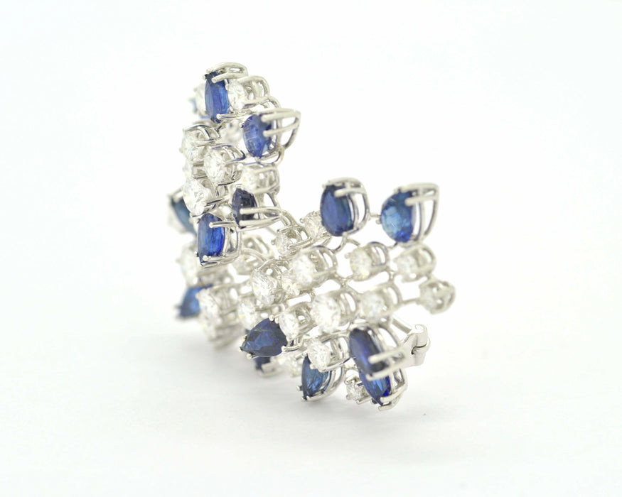 Broche Broche en or blanc avec diamants et saphirs 58 Facettes