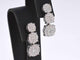 Boucles d'oreilles Boucles d'oreilles en or blanc avec trois chatons de diamants les uns en dessous des autres 58 Facettes 2110