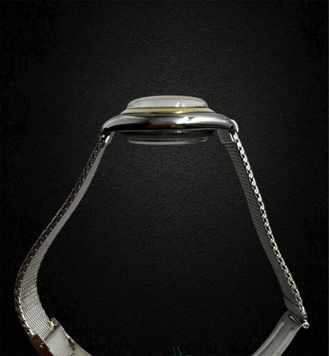 Montre Rolex « Ovetto » réf. 3133, or et acier 58 Facettes