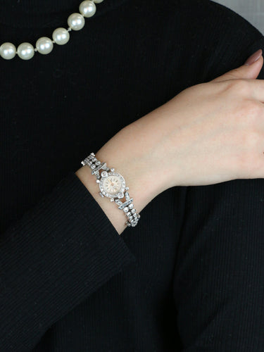 Montre Montre Art Deco or blanc platine diamants 58 Facettes 1088.1