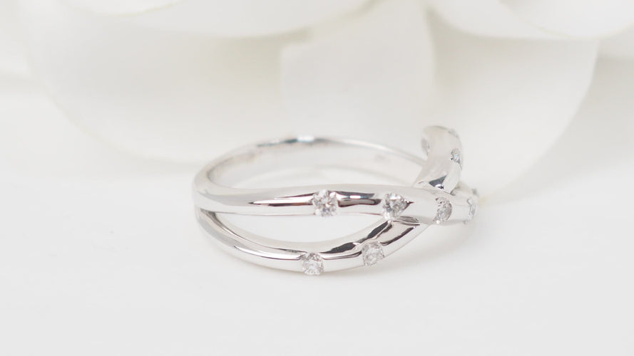 Bague 50 Bague croisée en or blanc et diamants 58 Facettes 30472
