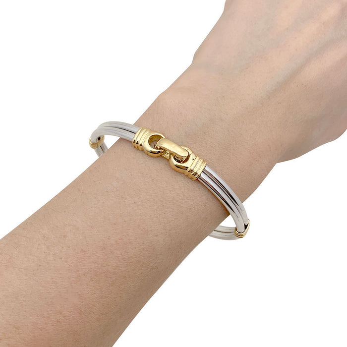 Bracelet or et acier.