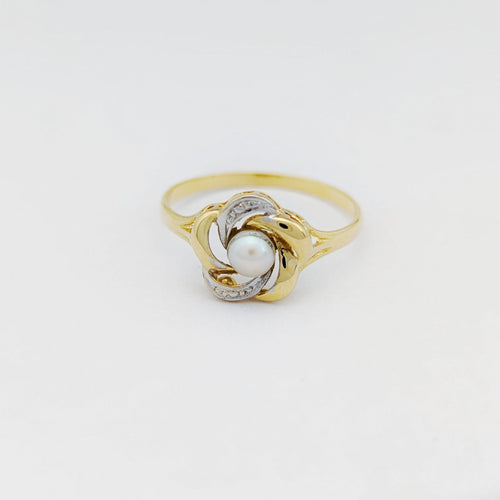 Bague fleur en or jaune et perle