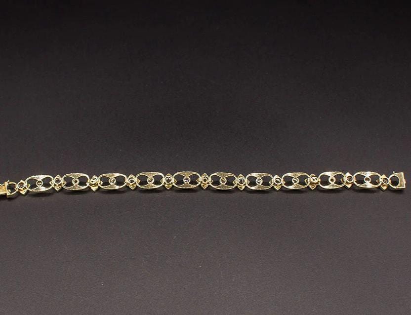 Bracelet Bracelet 1950 or jaune, platine, diamants 58 Facettes A8919