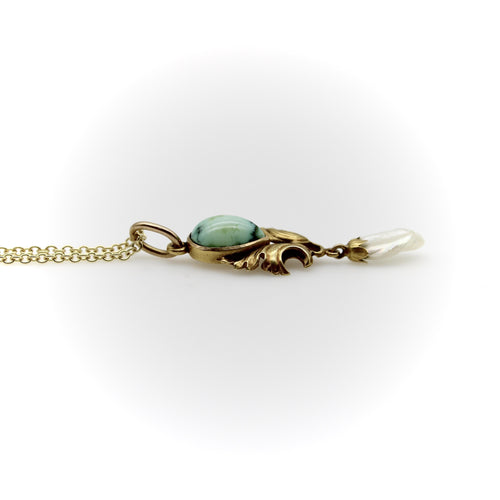 Pendentif Pendentif en or 14 carats, style Art Nouveau, turquoise et perle du Mississippi 58 Facettes A2005S