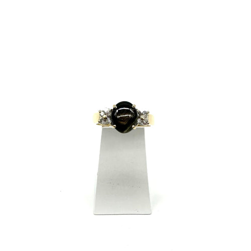 Bague 57 Bague or jaune, saphir noir étoilé et diamants 58 Facettes Z15B51684