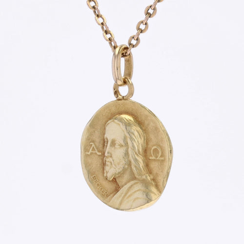 Pendentif Médaille de baptême or jaune Christ Catacombes signée Becker 58 Facettes CVP191