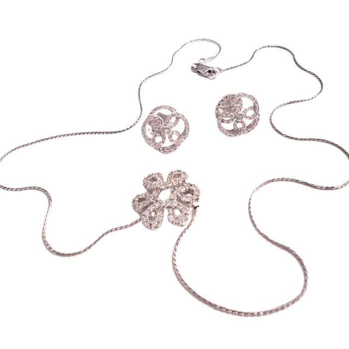 Collier Boucles d'oreilles et collier contemporains en or sertis de diamants 58 Facettes Q54B