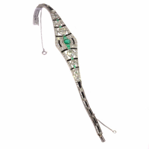 Bracelet Bracelet Art déco sophistiqué en platine : diamants, émeraudes et onyx 58 Facettes 20358-0165