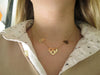 Collier collier POIRAY coeur entrelace multi 37 42cm en or jaune 18k 58 Facettes 265095