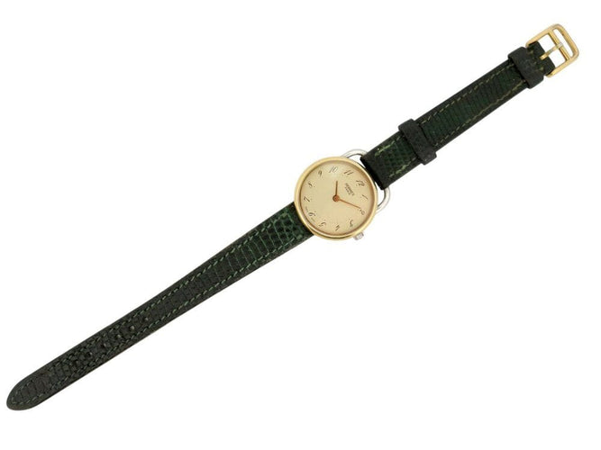 Montre vintage montre HERMES arceau plaque or 25 mm bracelet lezard quartz lady 58 Facettes 267938