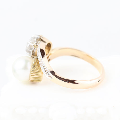 Bague Bague vintage toi et moi en or jaune 18 carats, sertie de diamants et ornée d'une perle. 58 Facettes 134237