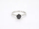 Bague 54 Bague en or blanc avec un diamant noir taille brillant et des diamants blancs 58 Facettes 2222