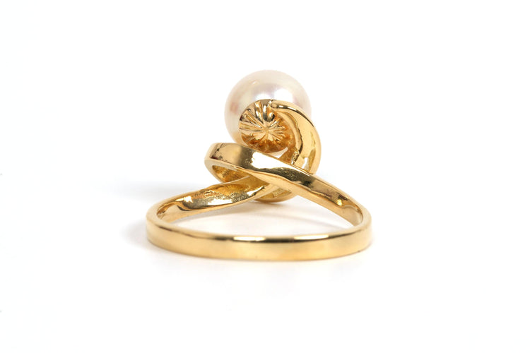 Bague 51 Bague Années 70 en or jaune 18 carats sertie d'une perle 58 Facettes 21857