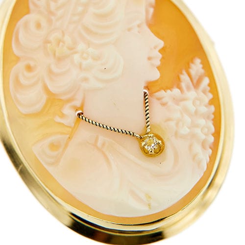 Pendentif Broche pendentif camée en or jaune 58 Facettes 37486