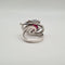 Bague 54 Bague or blanc sertie d'une rubellite et diamants naturels 58 Facettes
