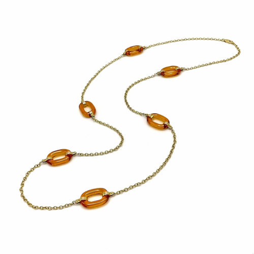 Collier Collier à maillons ovales en or et verre ambré sculpté 58 Facettes 10027