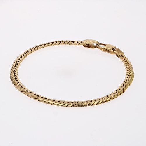 Bracelet Bracelet en or occasion gourmette aplatie 58 Facettes 24-330