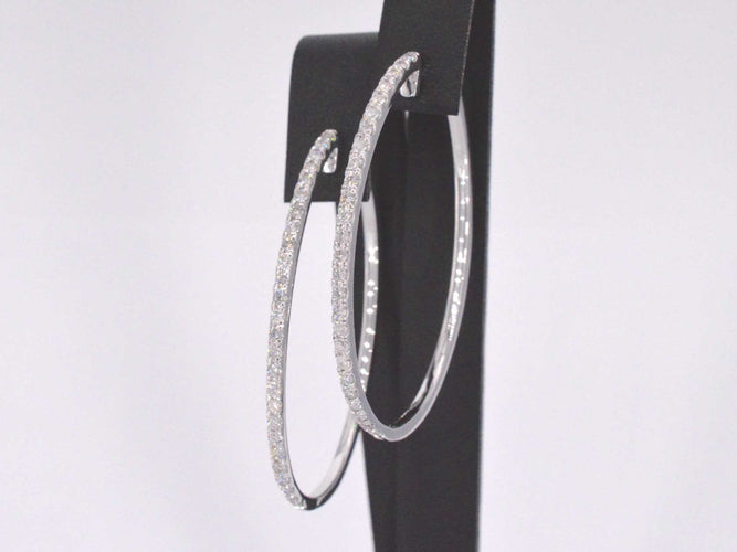 Boucles d'oreilles Boucles d'oreilles créoles en or blanc avec diamants 58 Facettes 2053