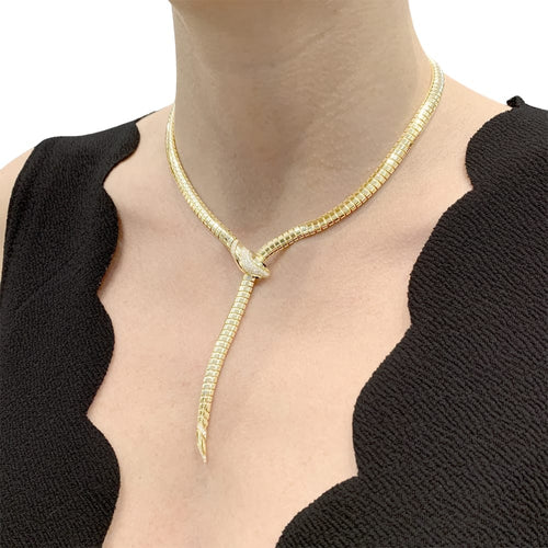 Collier Collier Bulgari, « Serpenti Tubogas », or jaune, diamants, onyx. 58 Facettes 35159